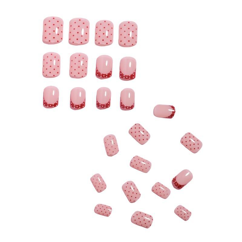 Stylish Press-On Nail Design with Polka Dot and French Tip Accents Stornfield
