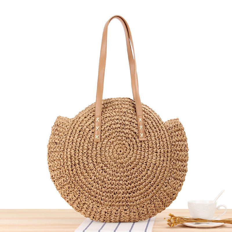 Round straw bag with leather handles Stornfield