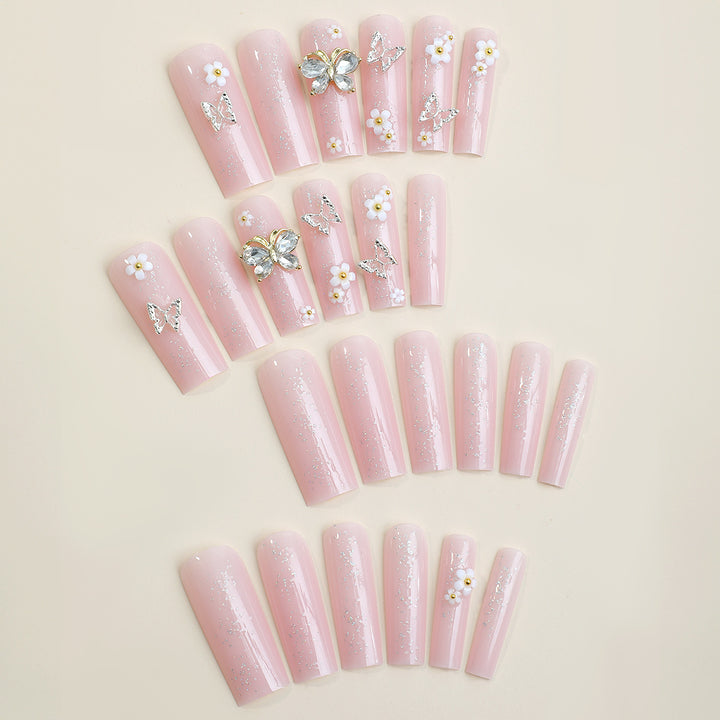 Artificial nail set with floral and glittering accents Stornfield