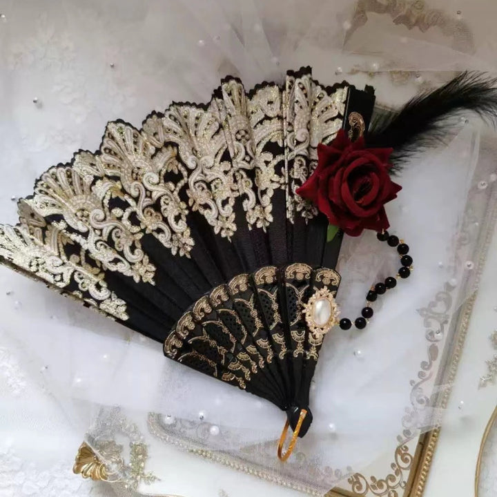 Ladies' elegant hand fan with intricate decorations Stornfield