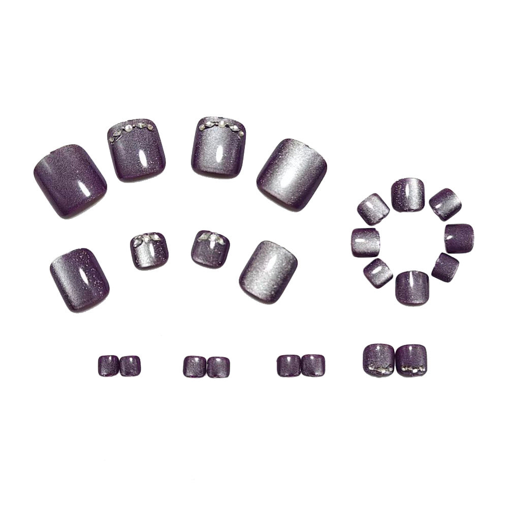 Shiny toenail art with rhinestone embellishment Stornfield