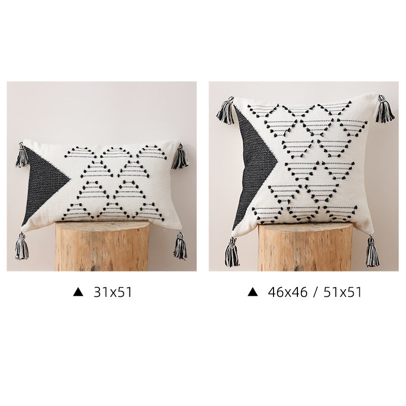 Decorative woven cushion cover with geometric tuft-relief and tassels Stornfield