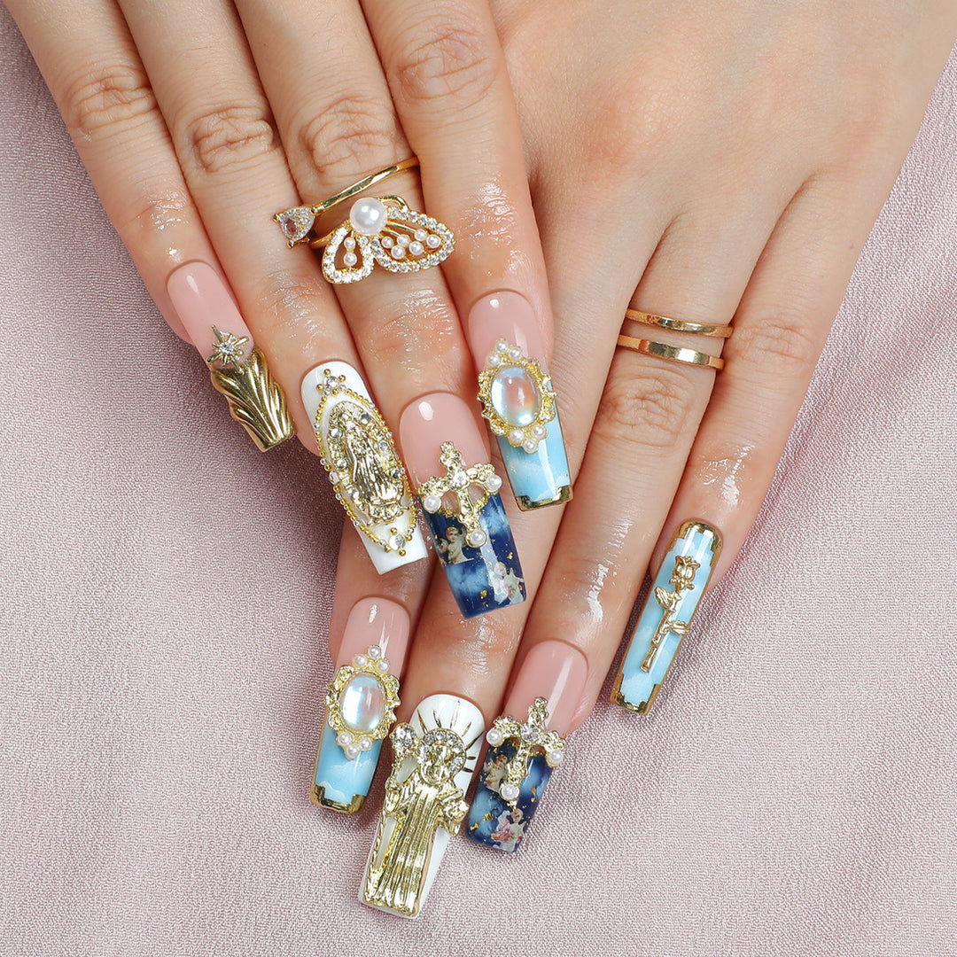 Elegant artificial nails with glamorous embellishments Stornfield