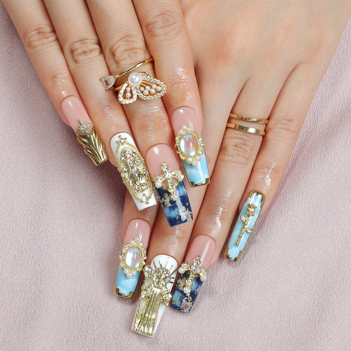 Elegant artificial nails with glamorous embellishments Stornfield