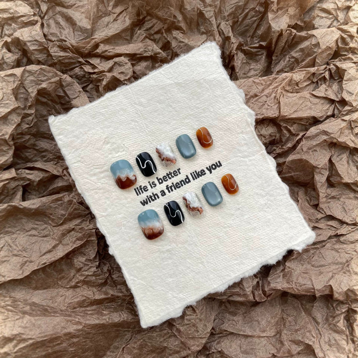 Artistic Press-On Nail Set with Stunning Marble Effect