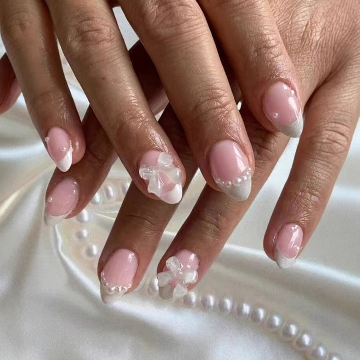Artificial nail set with exquisite 3D flowers and elegant pearl embellishments Stornfield