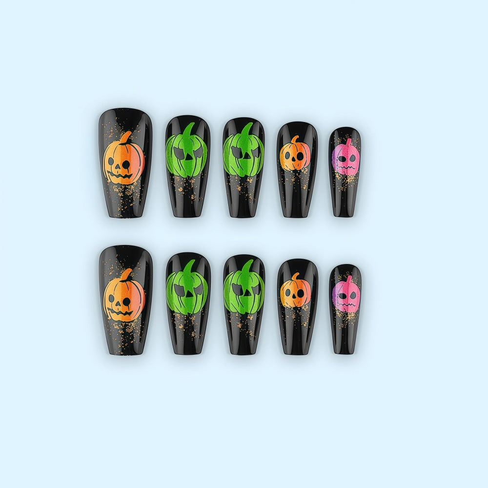 Halloween-style artificial nails with graphic pumpkin designs Stornfield