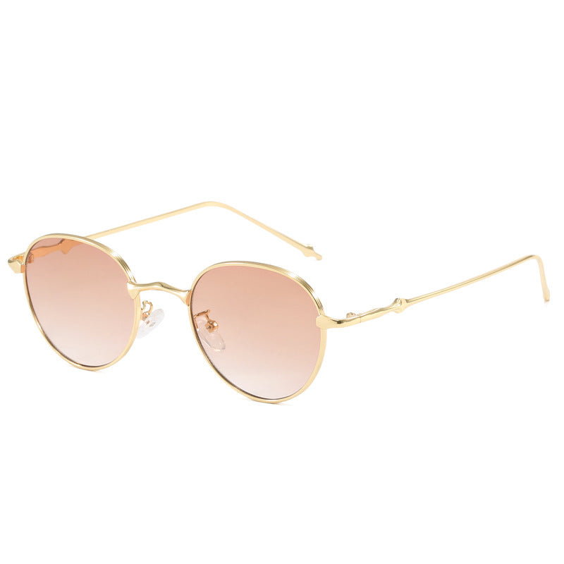 Ladies elegant round sunglasses with stylish metal frame Stornfield