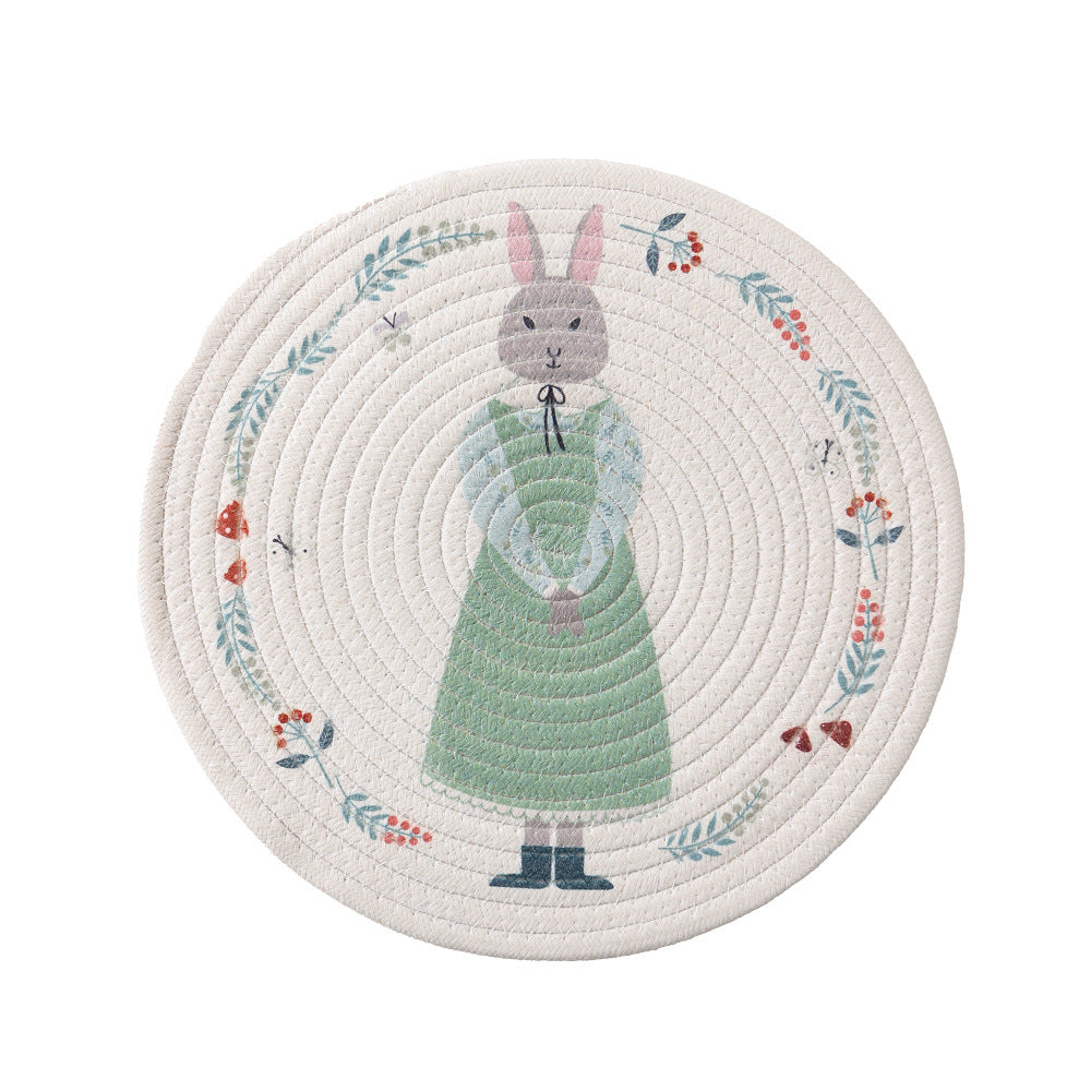 Round quilted table set placemat made of cotton blend with playful rhinoceros print