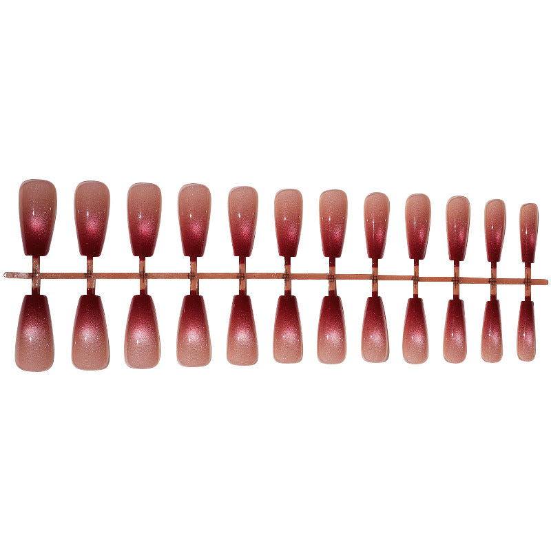 Acrylic nail set with glamorous gradient and glitter accents Stornfield