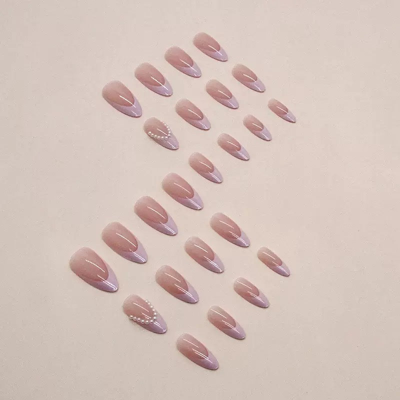 Elegant artificial nail tips with glitter and pearl decorations Stornfield