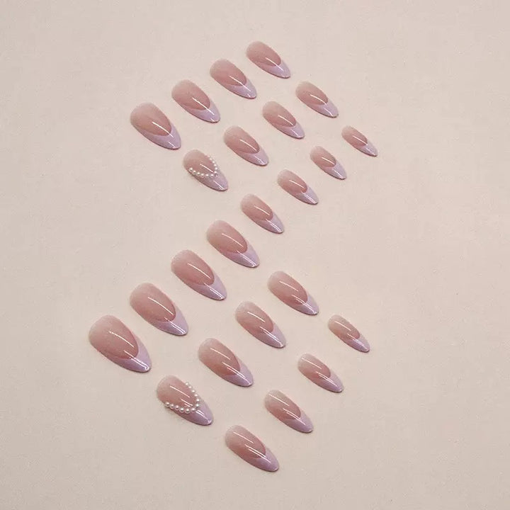 Elegant artificial nail tips with glitter and pearl decorations Stornfield