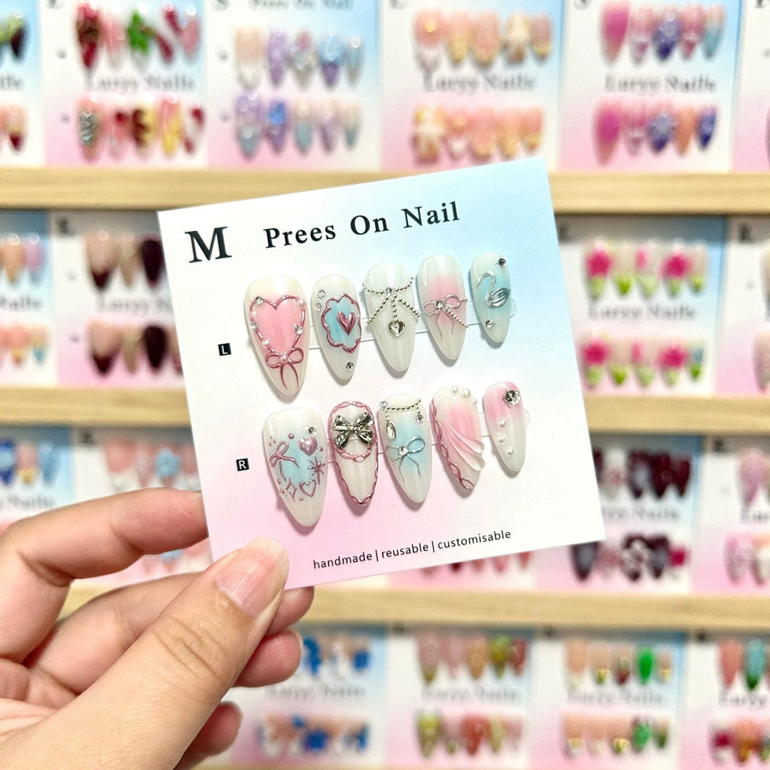 Artistic Press-On Nail Art Set with Heart and Bow Designs