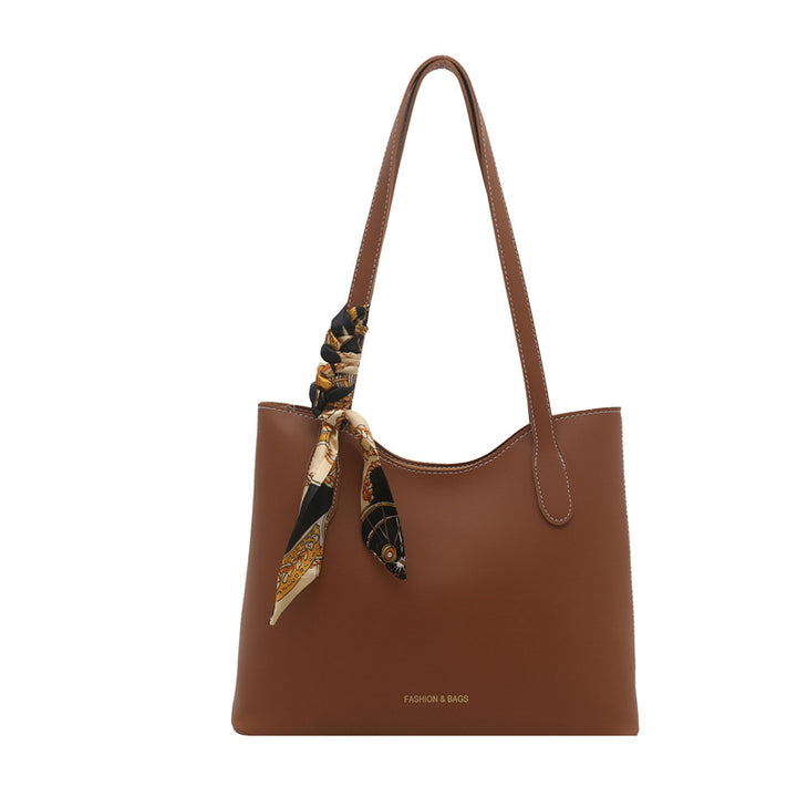 Elegant Structured Tote Handbag with Decorative Scarf