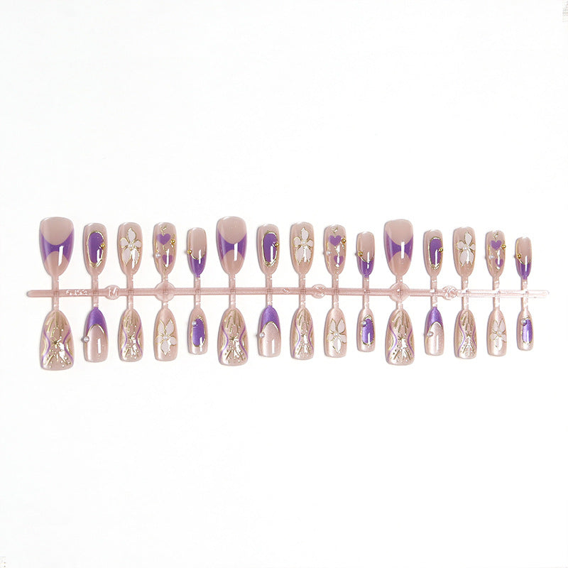 Elegant artificial nails with floral design and color accents Stornfield