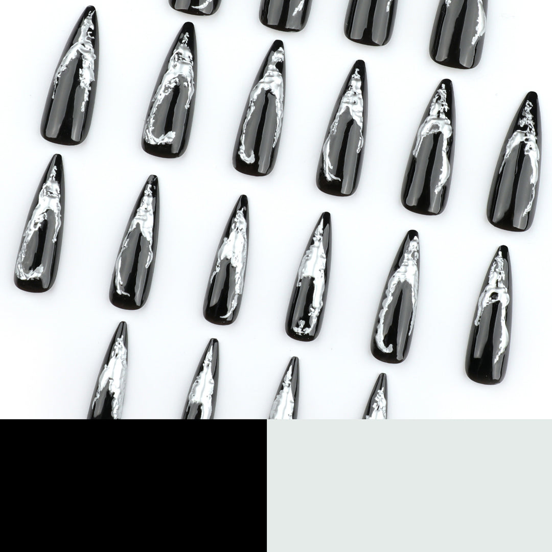 Artistic stiletto nails with modern metal effect Stornfield