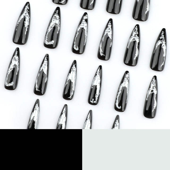 Artistic stiletto nails with modern metal effect Stornfield