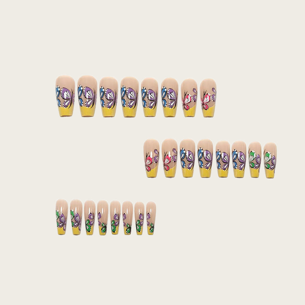 Nail set with intricate butterfly design Stornfield