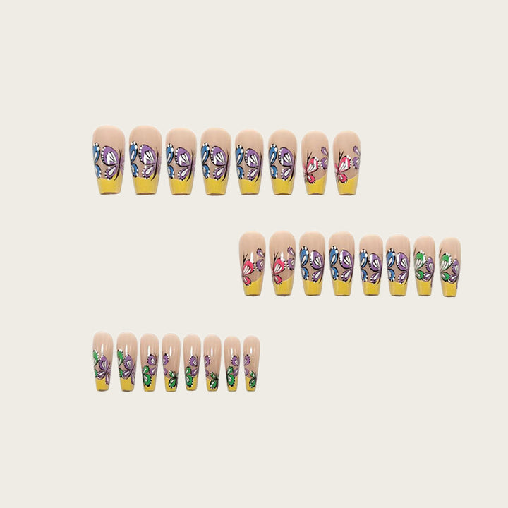 Nail set with intricate butterfly design Stornfield