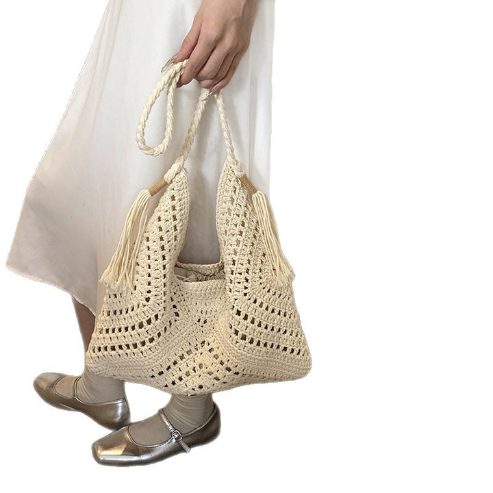 Hand-knotted shoulder bag with tassels and spacious interior Stornfield