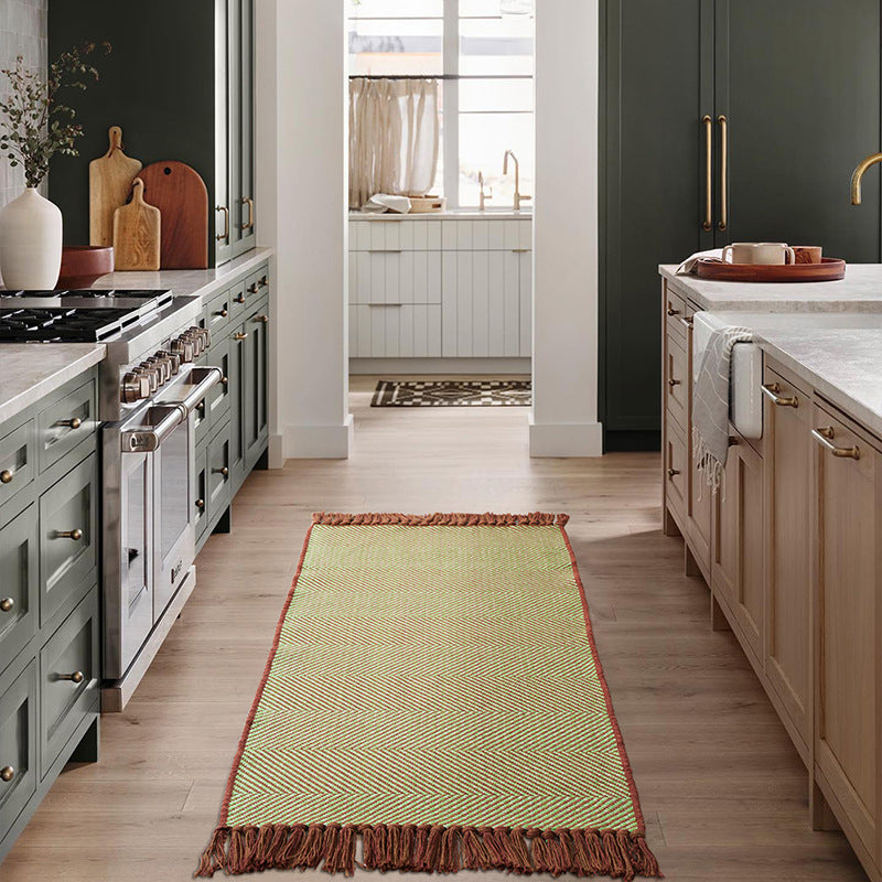 Woven table runner with dense herringbone jacquard and fringes Stornfield