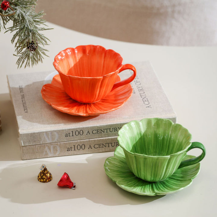 Ceramic mug with saucer in flower shape