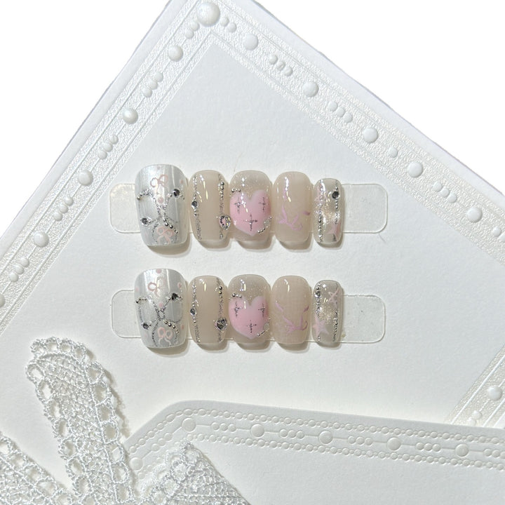 Decorative Press-On Nail Set with Heart and Silver Accents Stornfield