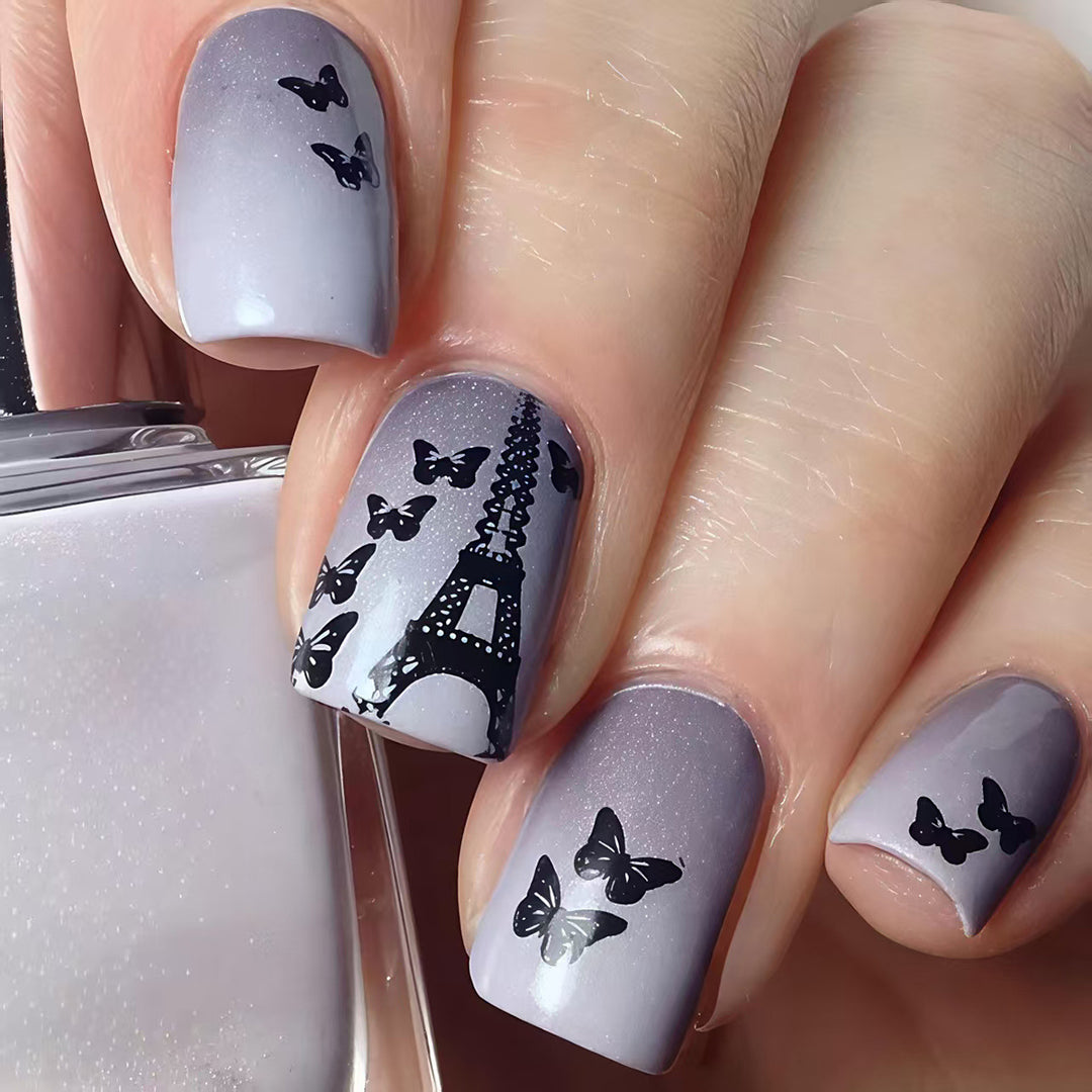 Artificial nails with Paris motif and butterflies Stornfield
