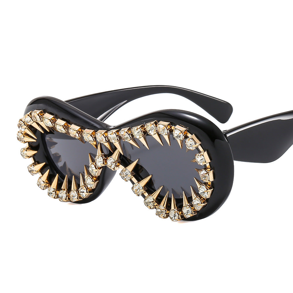 Women's fashionable sunglasses with extravagant spikes and crystal embellishments Stornfield