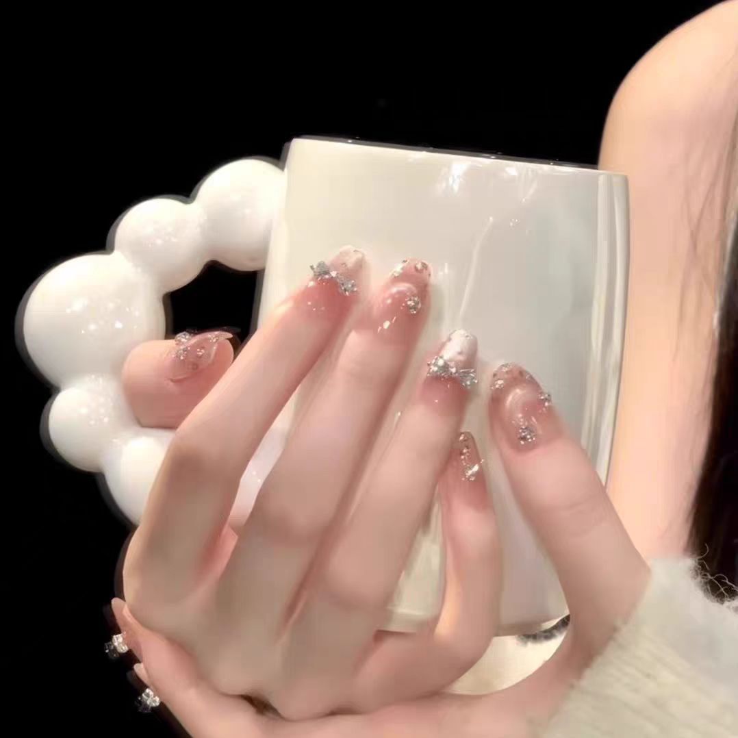 Artistic Press-On Nail Design with Floral Accents Stornfield