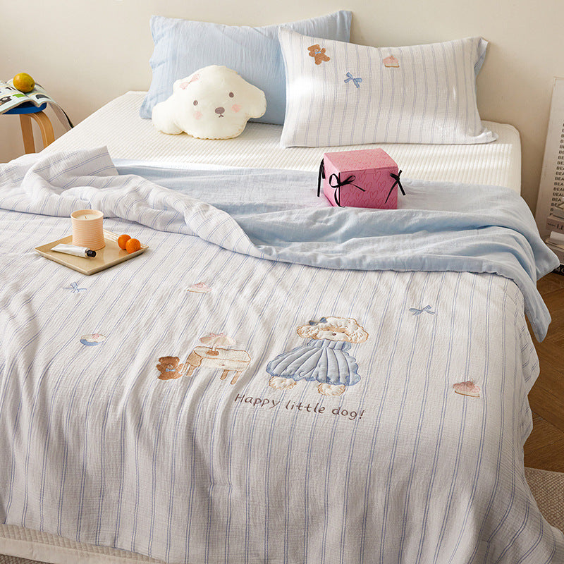 Quilted bedding and throw set with appliquéd plush puppy made of cotton muslin