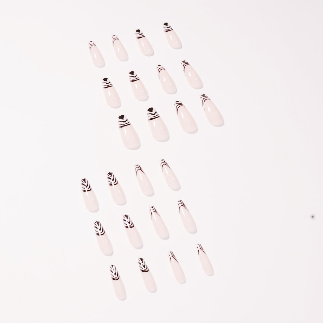 Artful Nail Extensions with Elegant Black-White Pattern Stornfield