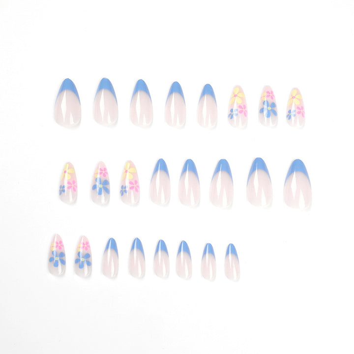 Artificial nail art with floral design and gradient Stornfield