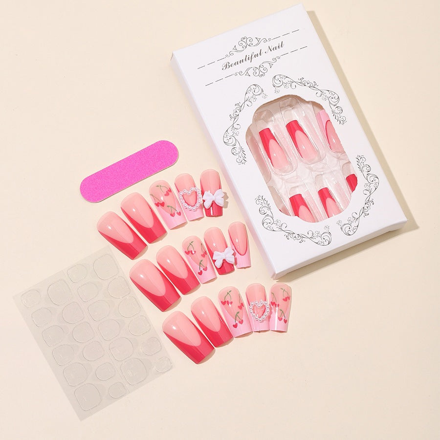 Nail art set with romantic cherry motifs and elegant accents Stornfield