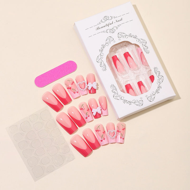 Nail art set with romantic cherry motifs and elegant accents Stornfield