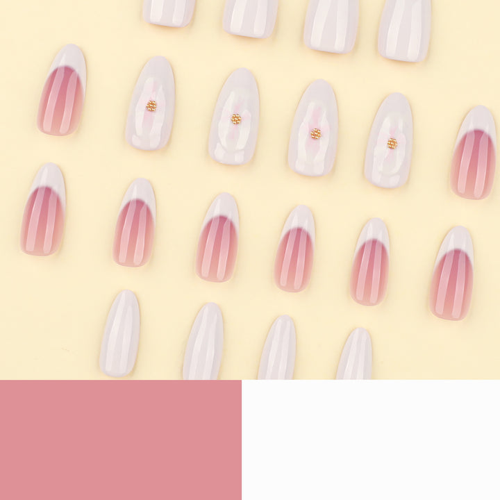 Artificial nails with flower accents and French tip Stornfield