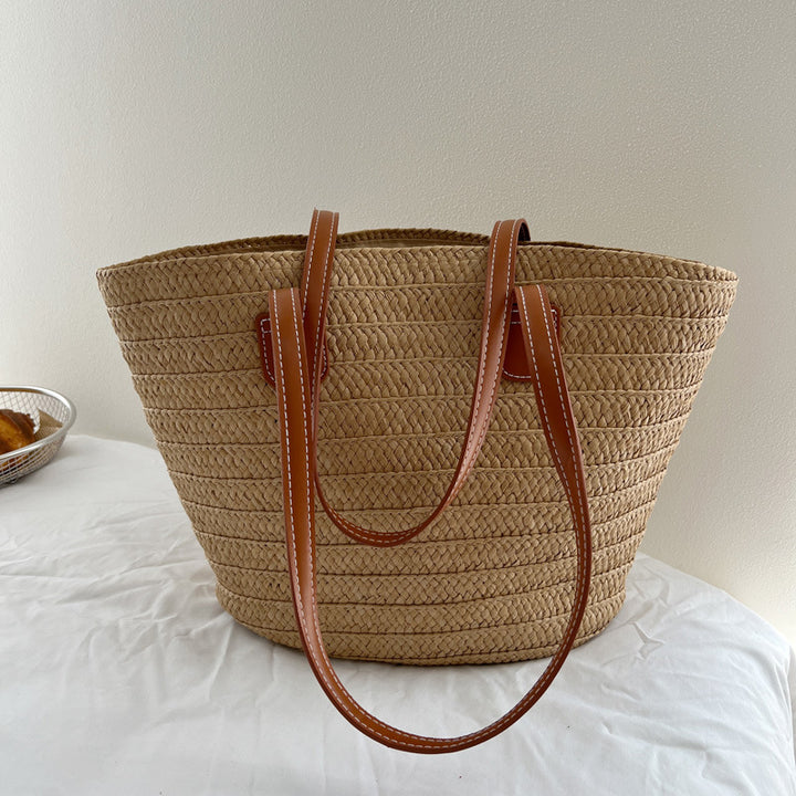 Handcrafted straw bag with elegant leather handles Stornfield
