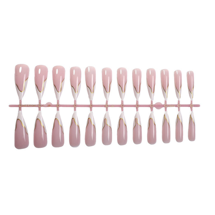 Elegant artificial nail collection with delicate gold embellishments Stornfield