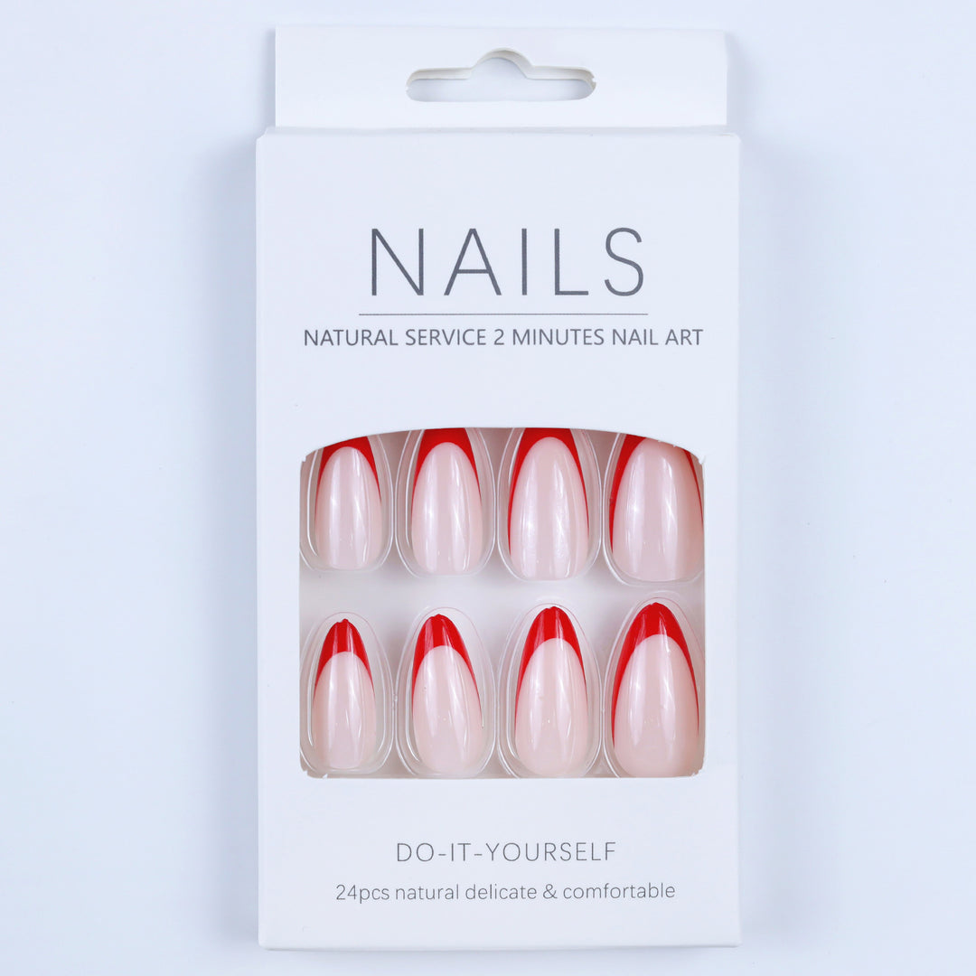 Artificial nails in stylish stiletto design with eye-catching top coat Stornfield