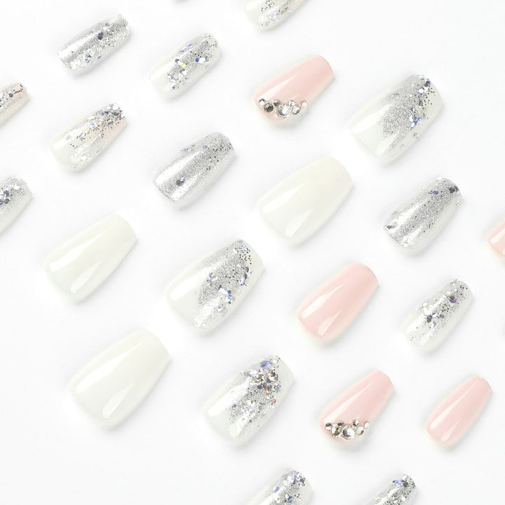 Elegant Nail Art with Glitter Details Stornfield