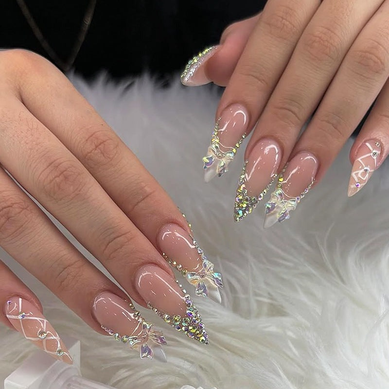 Artificial nail set with glitter and bow motif Stornfield