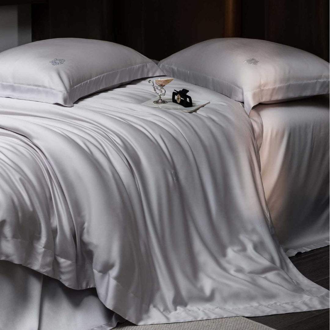 Luxurious satin bedding set made of cotton satin with a silky matte feel and tone-on-tone embroidery
