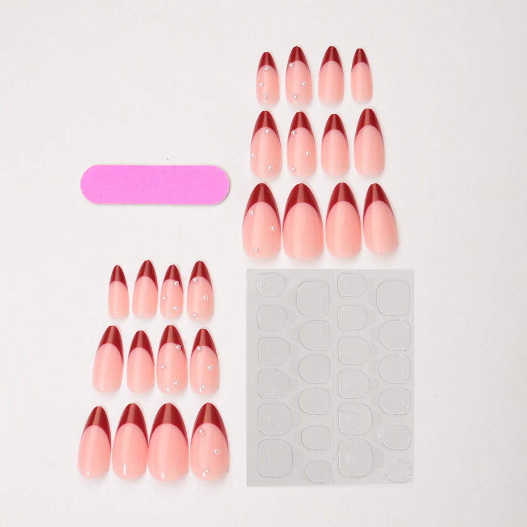 Artificial nail set with glamorous accents and elegant tips Stornfield