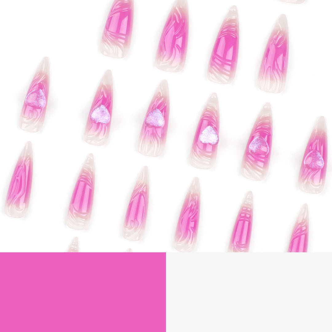 Artistic stiletto nails with heart design and glitter accents Stornfield