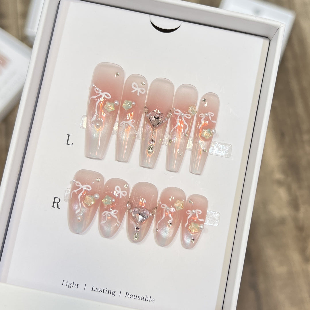 Elegant Press-On Nail Art Set with Chic Ribbon and Gem Accents Stornfield