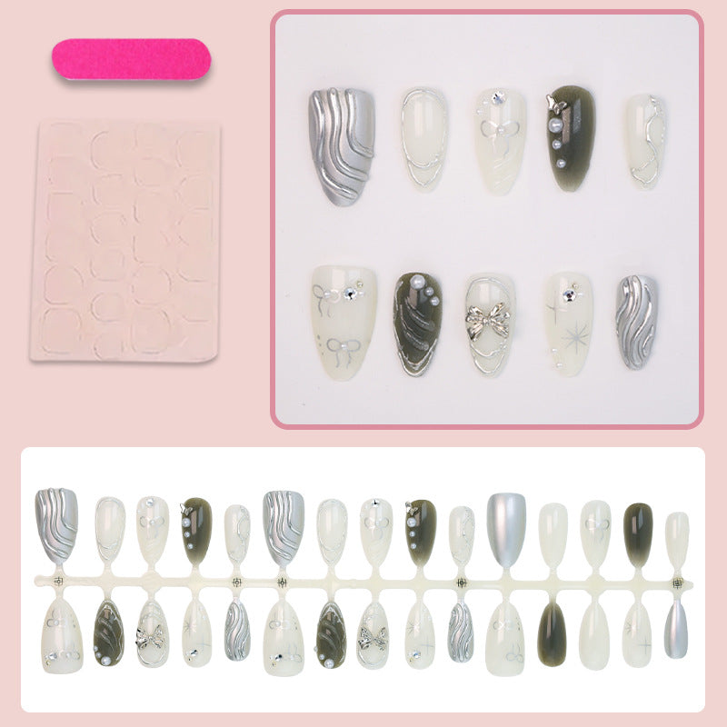 Nail set with luxurious 3D decorations and elegant stone accents Stornfield