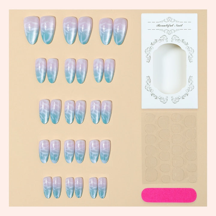 Artificial nail set with elegant gradient and shimmering accents Stornfield
