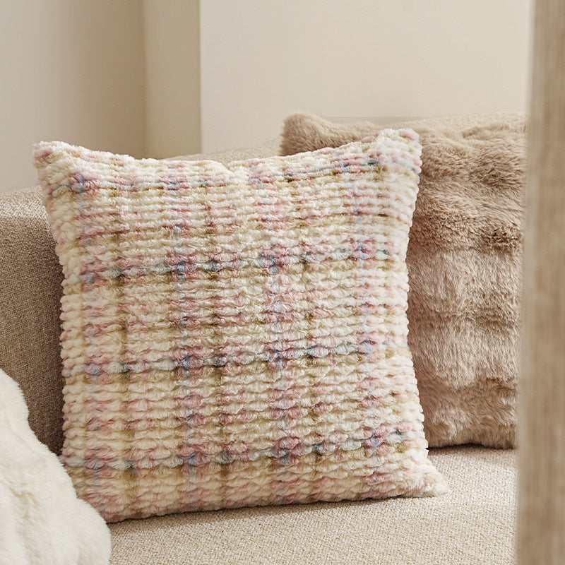 Square decorative cushion made of soft faux fur with inner cushion
