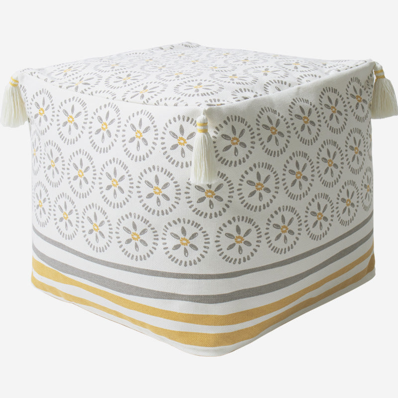 Square pouf seat cube made of cotton blend fabric with boho embroidery and tassels