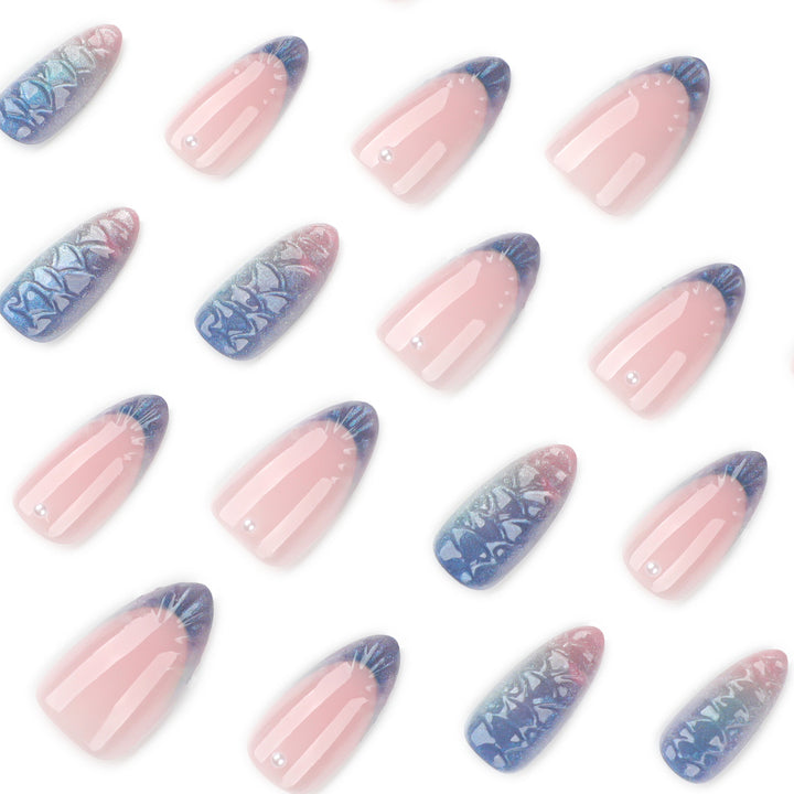 Artful nail extensions with shimmering play of colors and glamorous accents Stornfield